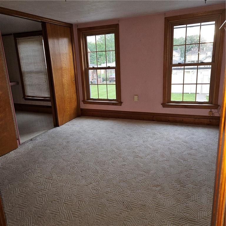 111 Laughlin Street Dawson, PA 15428 - Photo 15 of 21 an empty room with windows