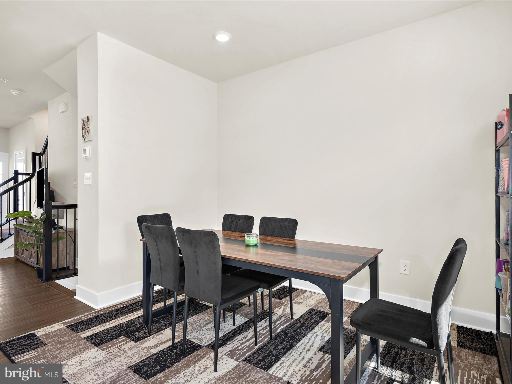 2324 Woodlands Road Baltimore, MD 21244 - Photo 15 of 44 a view of a dining room with furniture and wooden floor