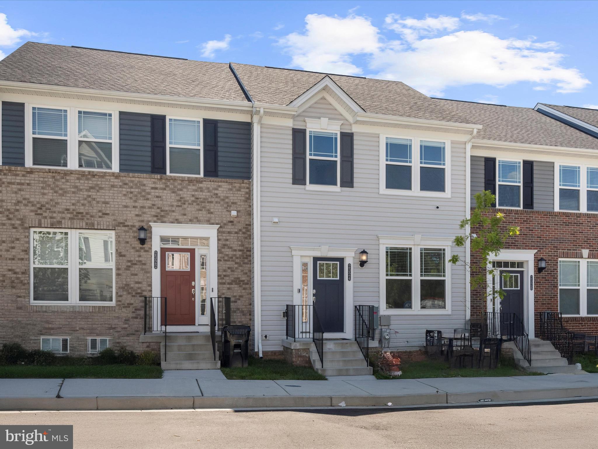2324 Woodlands Road Baltimore, MD 21244 - Photo 2 of 44 a front view of a house with yard