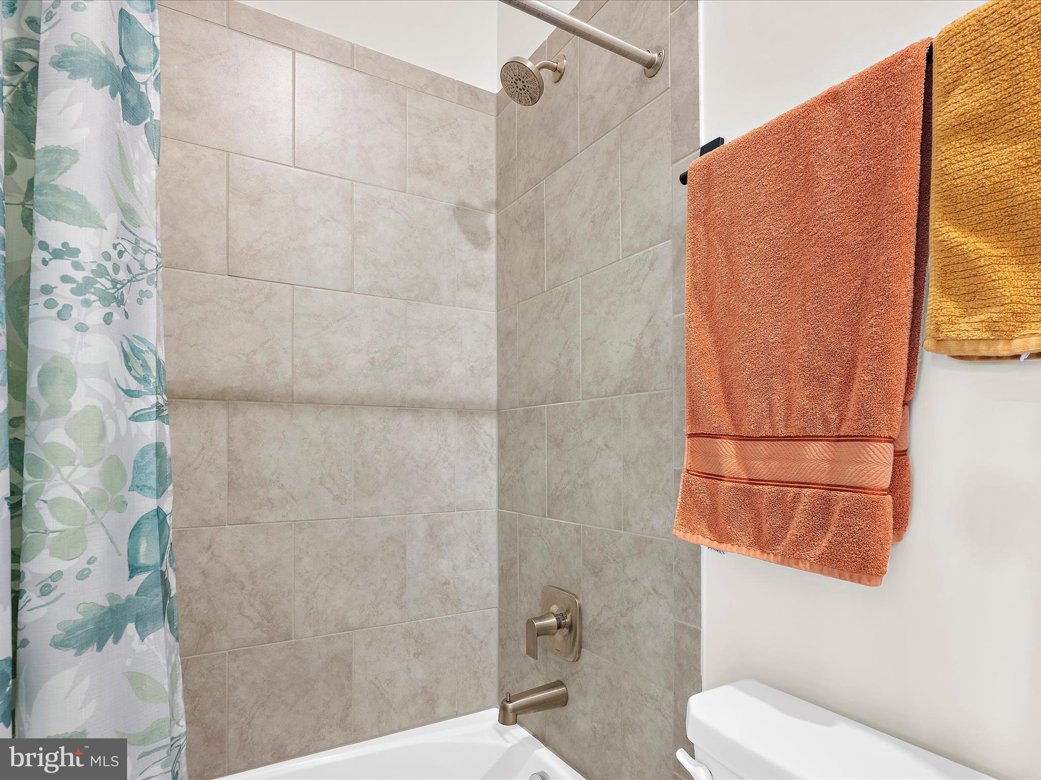 2324 Woodlands Road Baltimore, MD 21244 - Photo 26 of 44 a bathroom with a toilet and shower