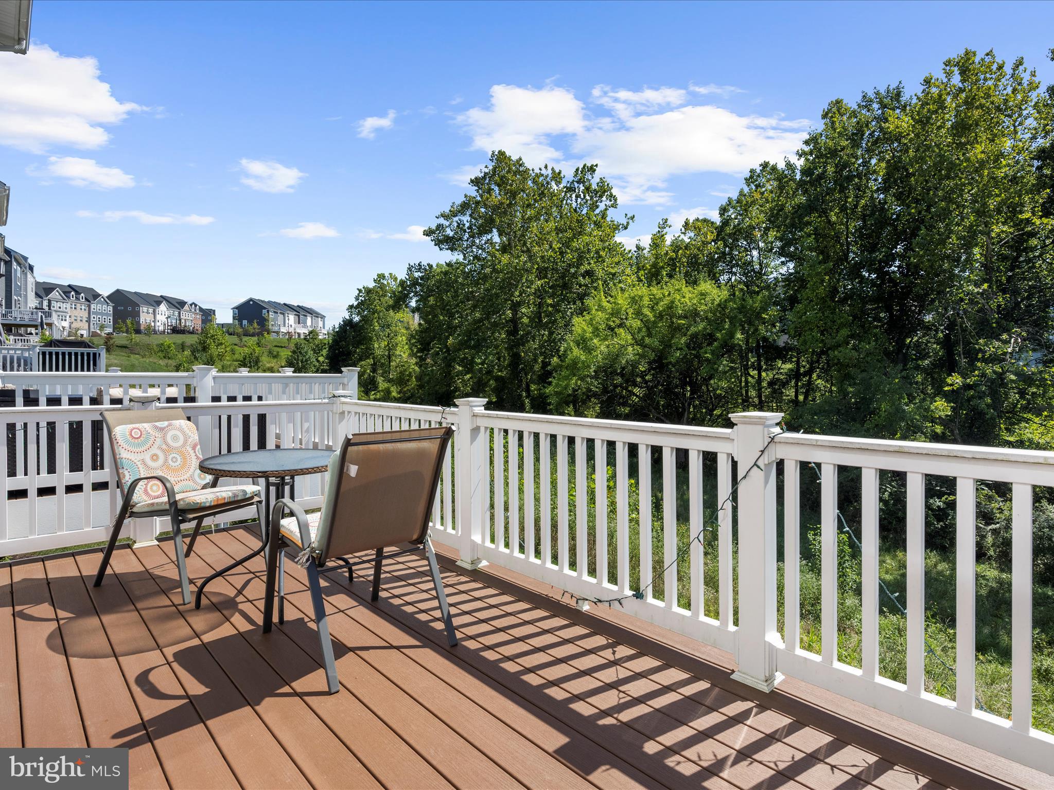 2324 Woodlands Road Baltimore, MD 21244 - Photo 33 of 44 a view of a chairs on wooden deck