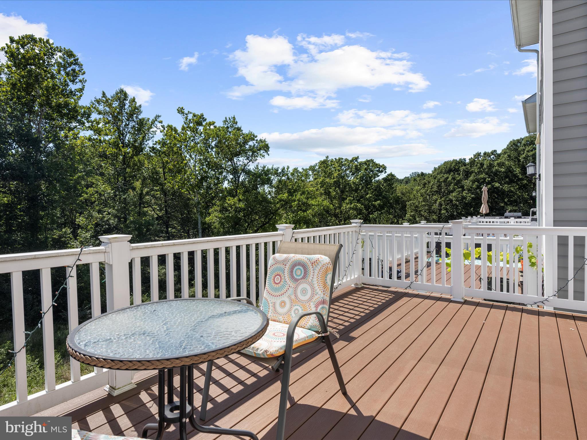 2324 Woodlands Road Baltimore, MD 21244 - Photo 34 of 44 a view of a chairs on wooden deck