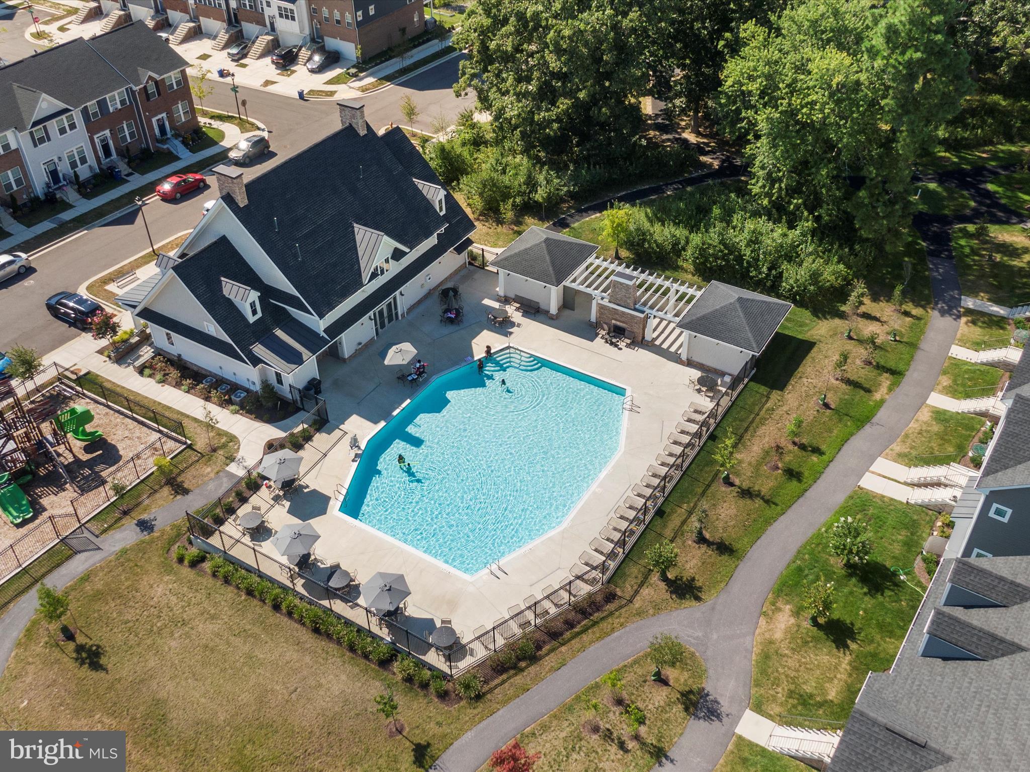 2324 Woodlands Road Baltimore, MD 21244 - Photo 43 of 44 an aerial view of a house with a swimming pool