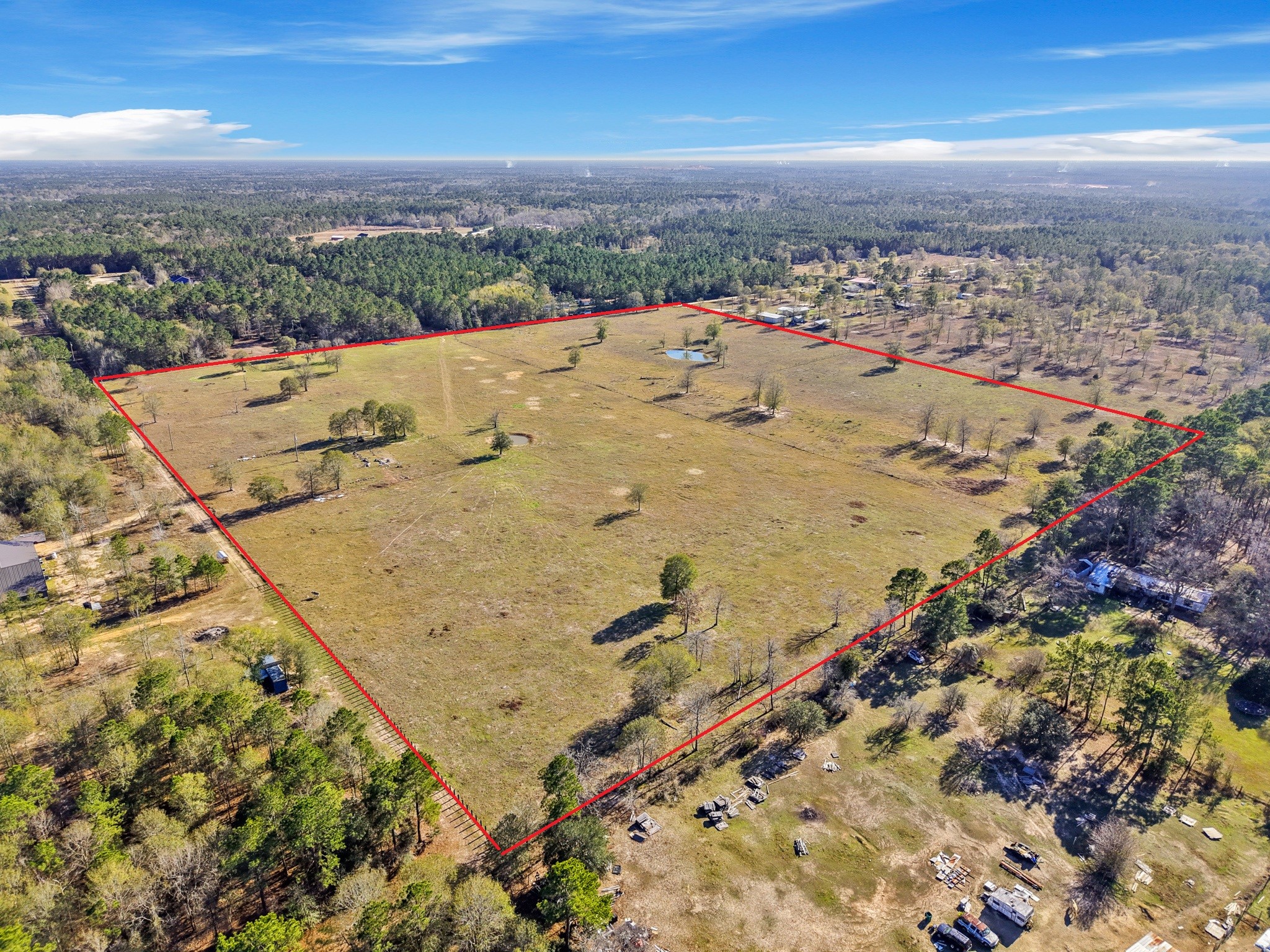 9789 North Walker Road Cleveland, TX 77328 - Photo 7 of 10 This is a standout opportunity for buyers seeking acreage, freedom, and room to build or expand in a peaceful, rural setting.