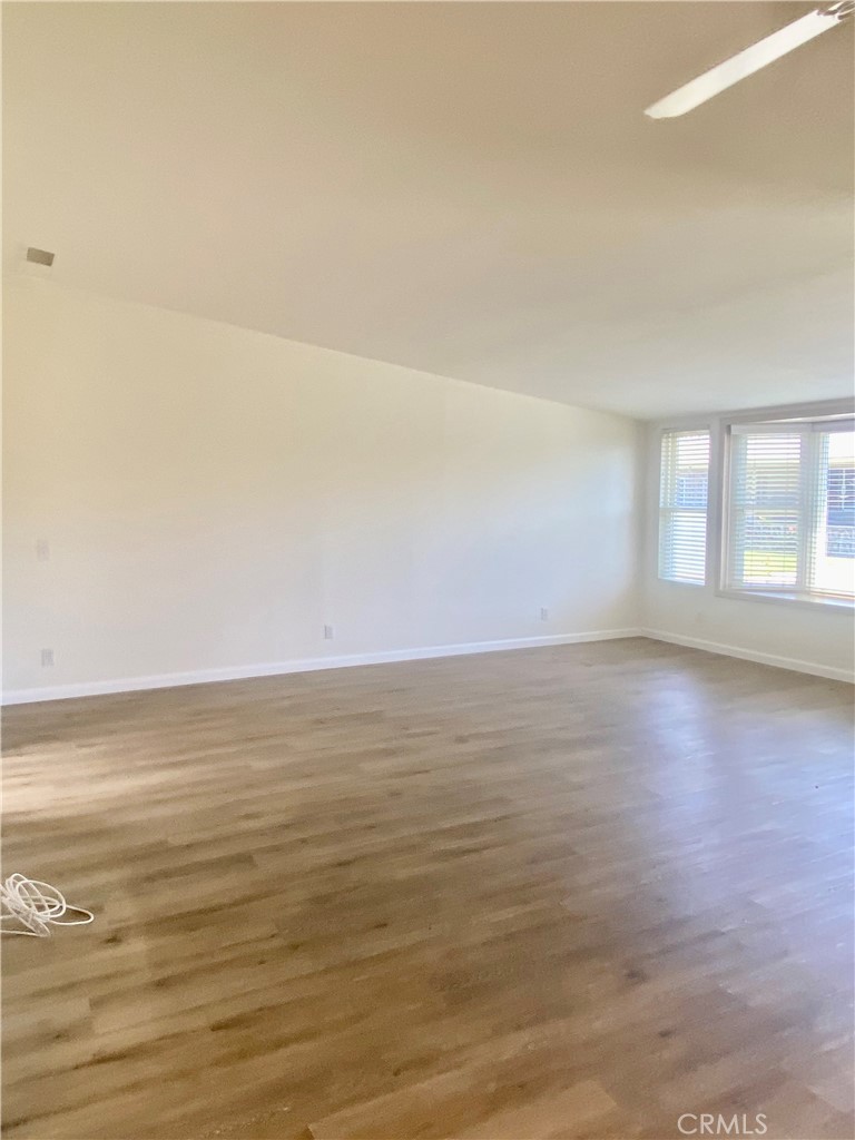 1670 Interlachen Road Seal Beach, CA 90740 - Photo 9 of 44 DINING ROOM LOOKING INTO LIVING ROOM