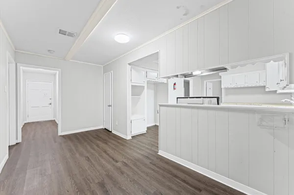 a view of kitchen with wooden floor