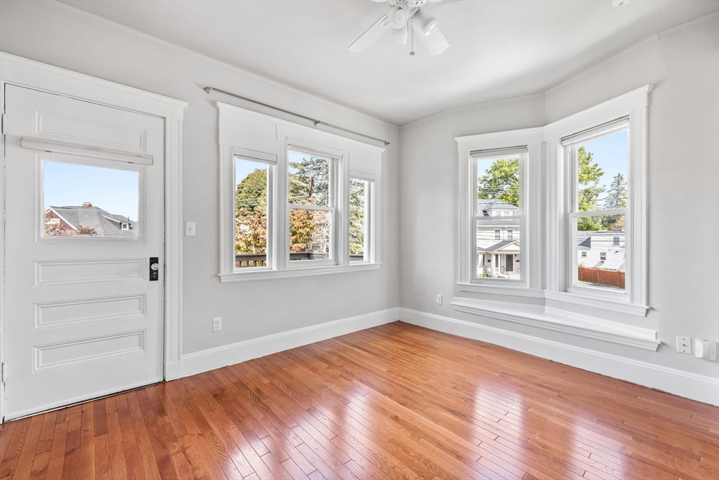 582 High Street, Unit 2 Medford, MA 02155 - Photo 11 of 27 a view of an empty room with a window