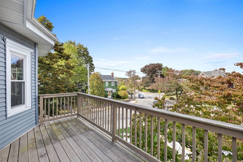 582 High Street, Unit 2 Medford, MA 02155 - Photo 24 of 27 a view of a balcony with wooden floor