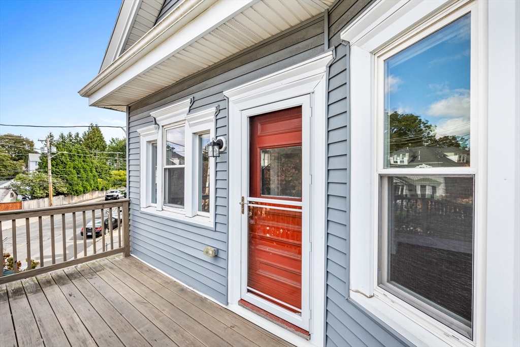 582 High Street, Unit 2 Medford, MA 02155 - Photo 25 of 27 a view of a brick house with a large window