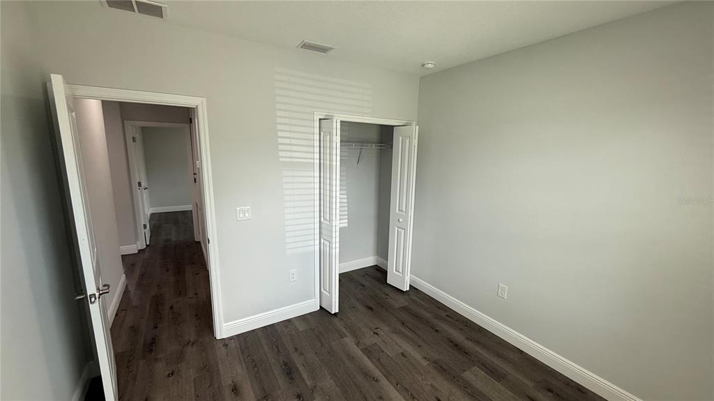 11079 Kimberly Avenue Englewood, FL 34224 - Photo 14 of 14 wooden floor in an empty room