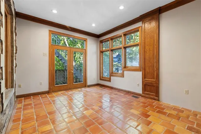 en empty room with a large window