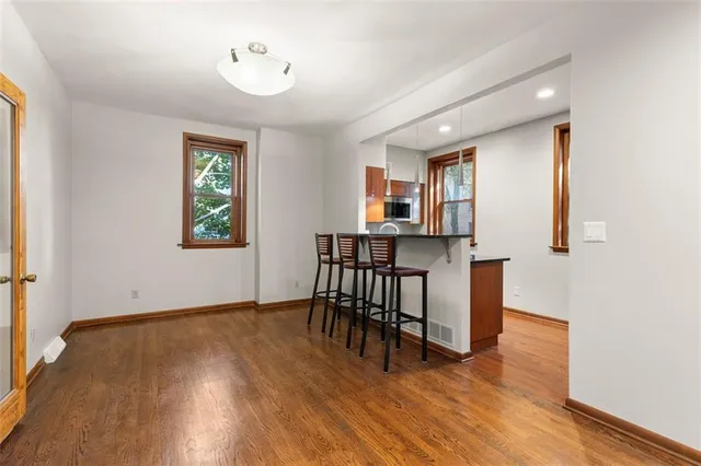a view of a livingroom with furniture and window