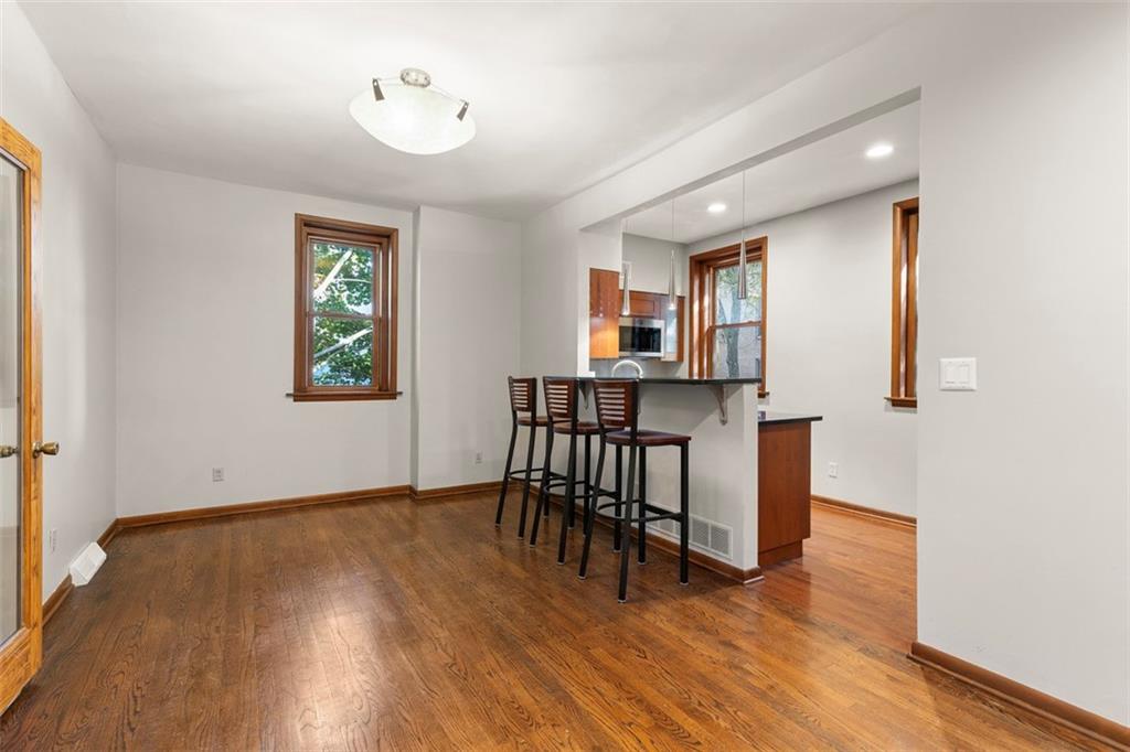 6109 Fifth Avenue, Unit 2 Pittsburgh, PA 15232 - Photo 10 of 31 a view of kitchen with furniture and wooden floor