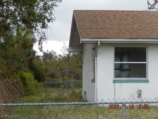 37531 Washington Loop Road Punta Gorda, FL 33982 - Photo 3 of 16 a view of wooden door