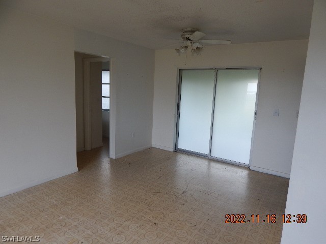 37531 Washington Loop Road Punta Gorda, FL 33982 - Photo 8 of 16 an empty room with a mirror