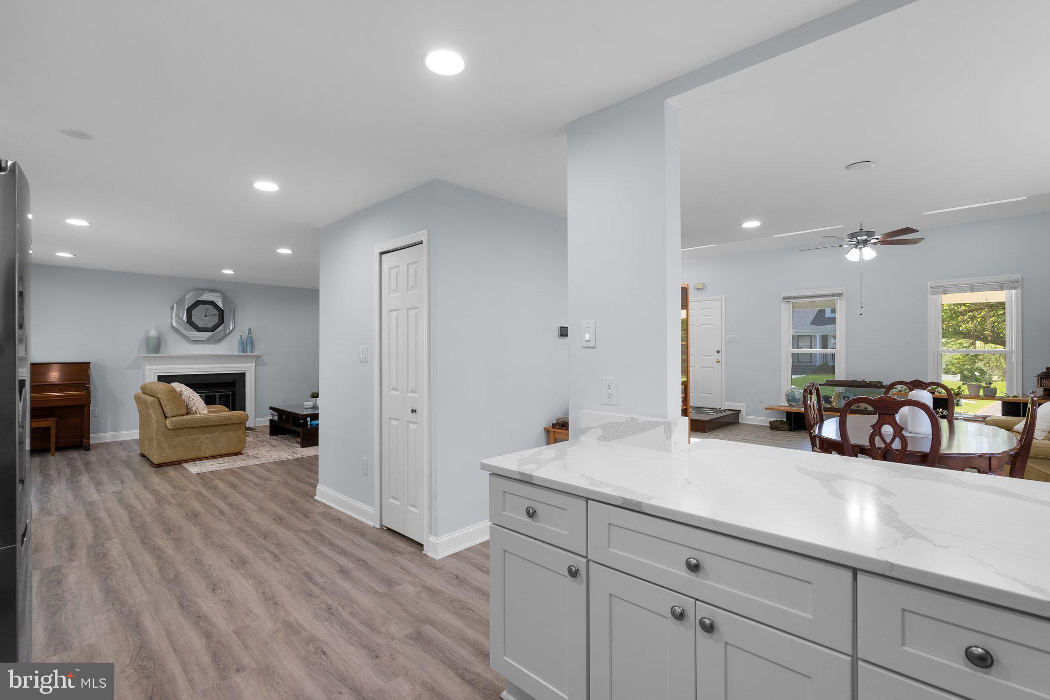 11631 Ranch Lane North Potomac, MD 20878 - Photo 13 of 32 a view of a room with wooden floor and furniture