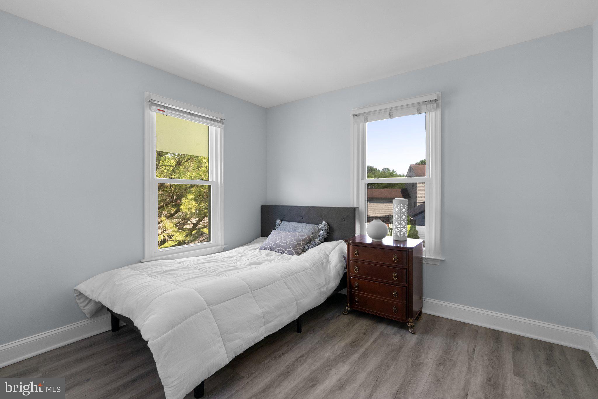 11631 Ranch Lane North Potomac, MD 20878 - Photo 24 of 32 a bedroom with a bed and a window