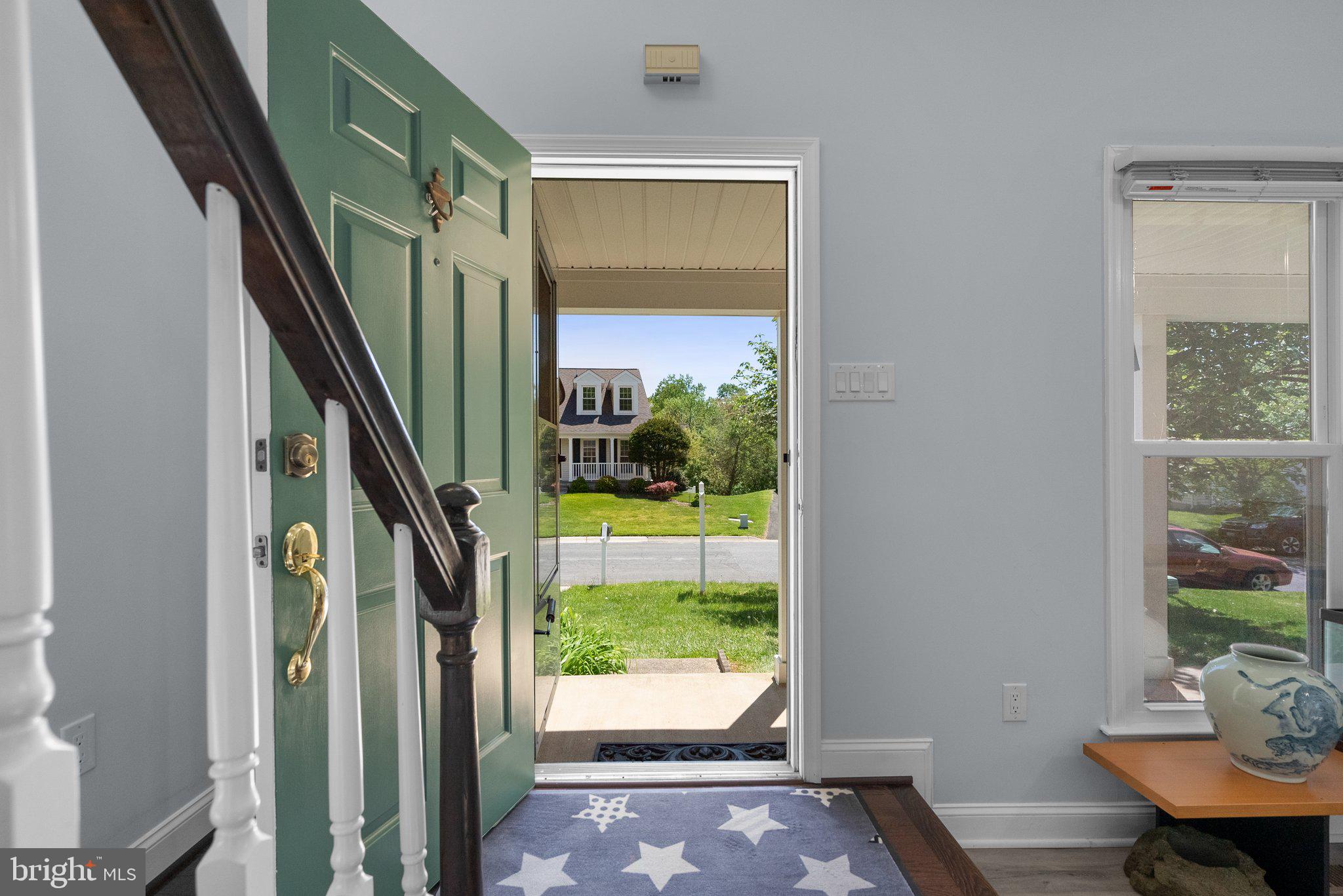 11631 Ranch Lane North Potomac, MD 20878 - Photo 3 of 32 a view of entryway with wooden floor and windows