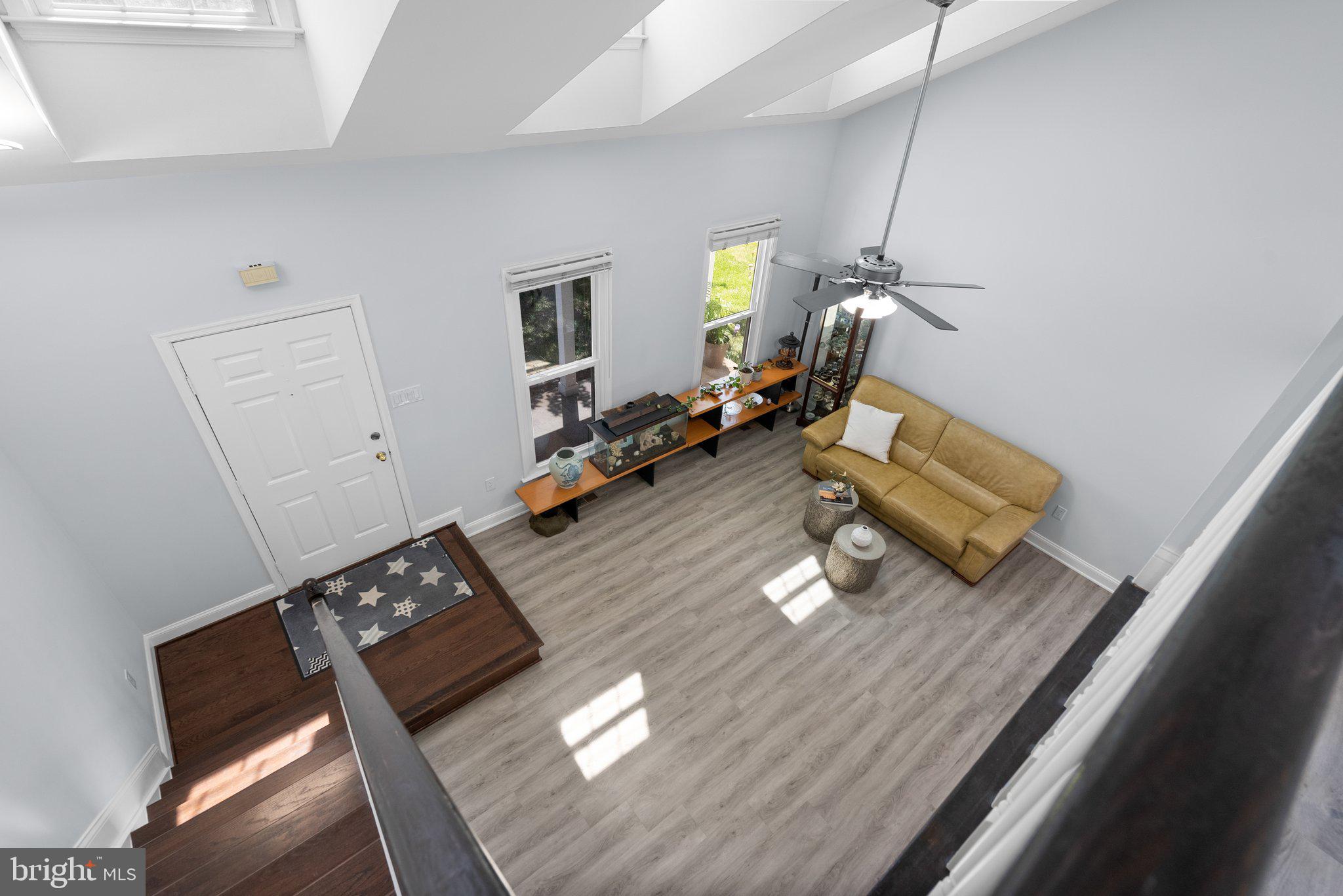 11631 Ranch Lane North Potomac, MD 20878 - Photo 8 of 32 a living room with furniture and a wooden floor
