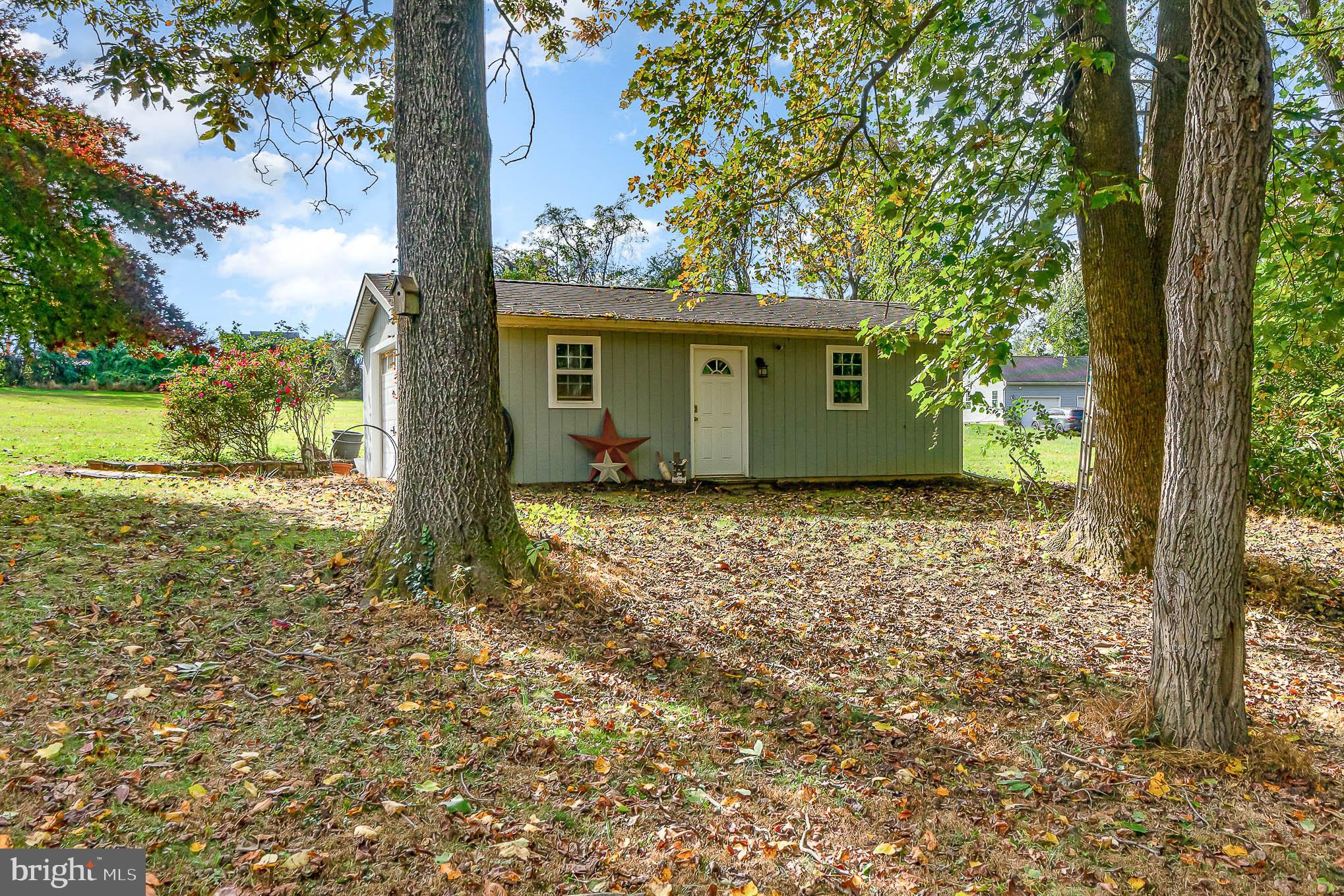 1062 Dr Jack Road Conowingo, MD 21918 - Photo 37 of 51 EXTRA LARGE Shed with door and Garage door opening
