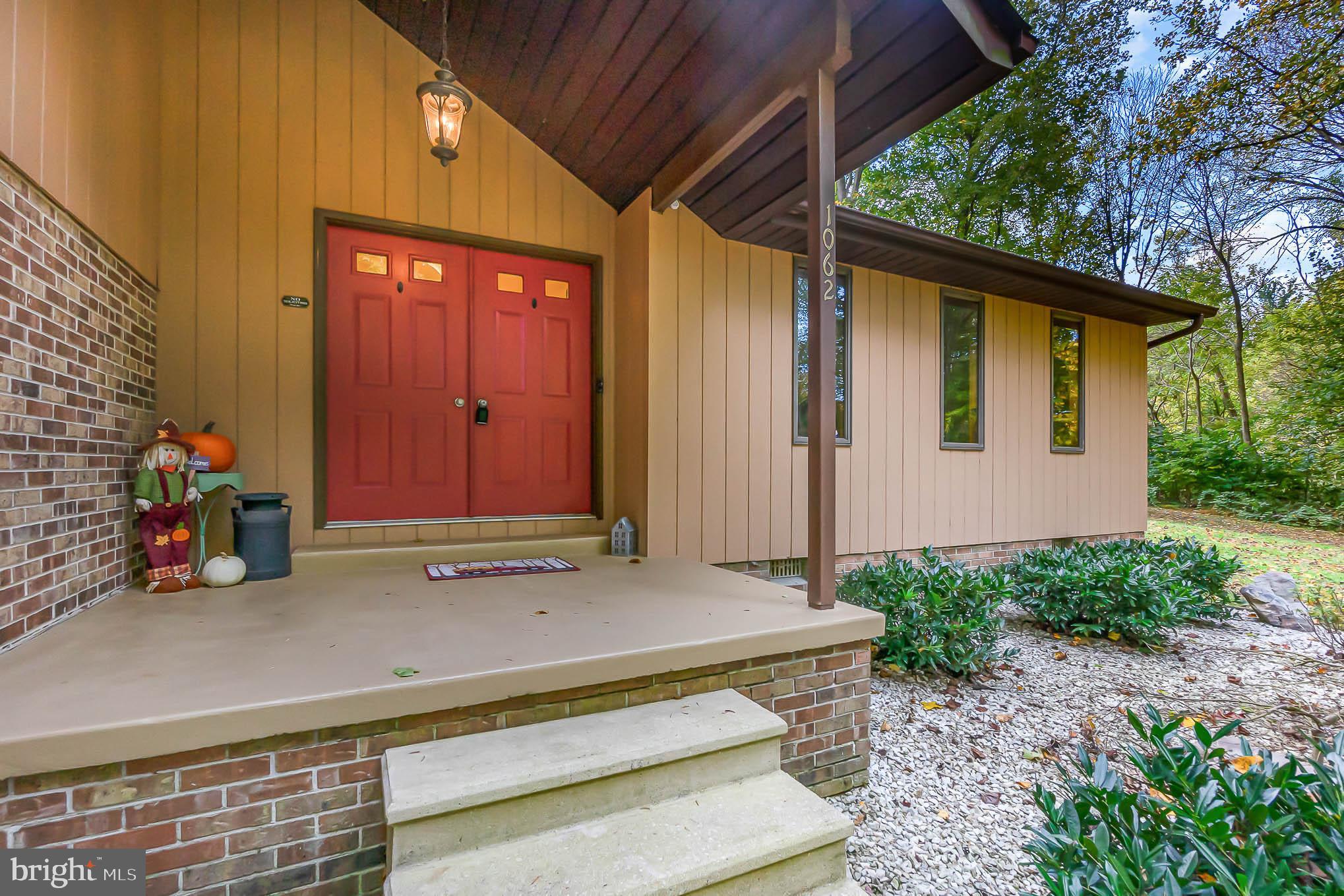 1062 Dr Jack Road Conowingo, MD 21918 - Photo 4 of 51 WOW! Red doors and huge porch are so welcoming!