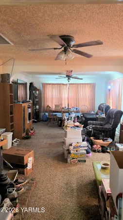 a room with gym equipment and a window