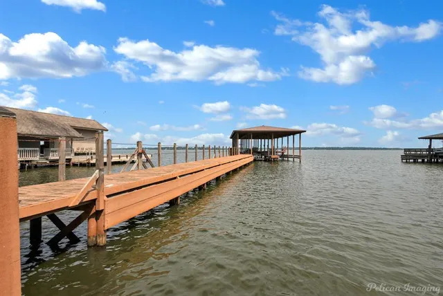 a view of swimming pool with outdoor seating