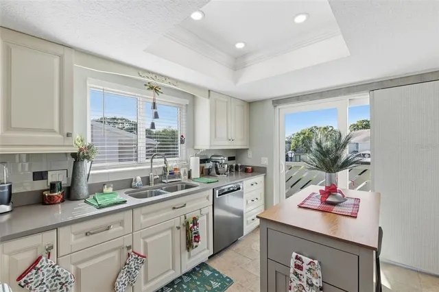 a kitchen that has a lot of cabinets in it