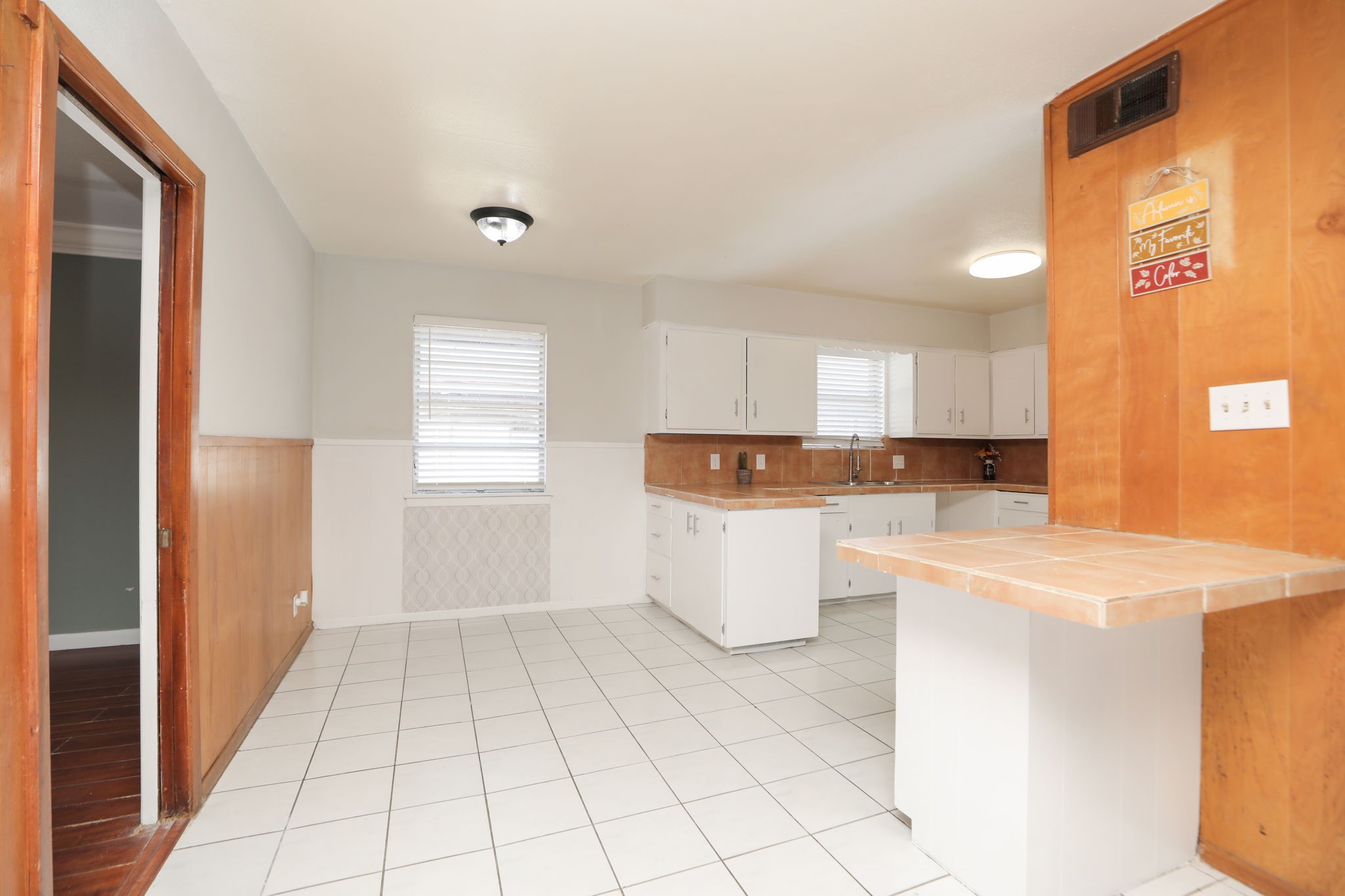 8235 Dover Street Houston, TX 77061 - Photo 13 of 36 a view of a kitchen with appliances and cabinets