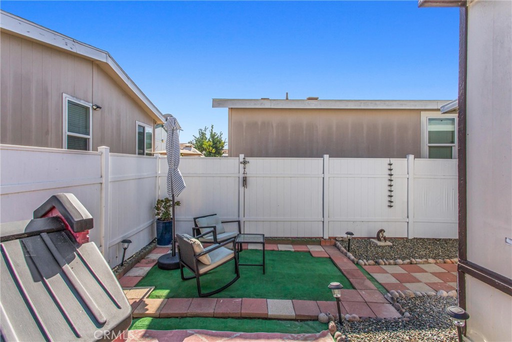 8681 Katella Avenue, Unit 897 Stanton, CA 90680 - Photo 25 of 31 a view of a backyard with sitting area