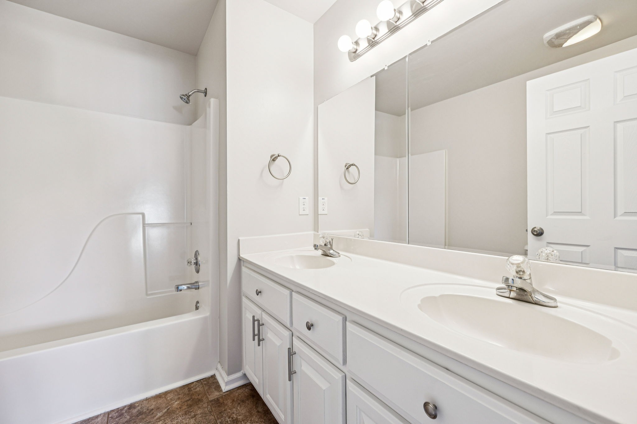 2995 Pipkin Hills Drive Spring Hill, TN 37174 - Photo 33 of 43 a bathroom with a sink double vanity granite tub shower and a mirror