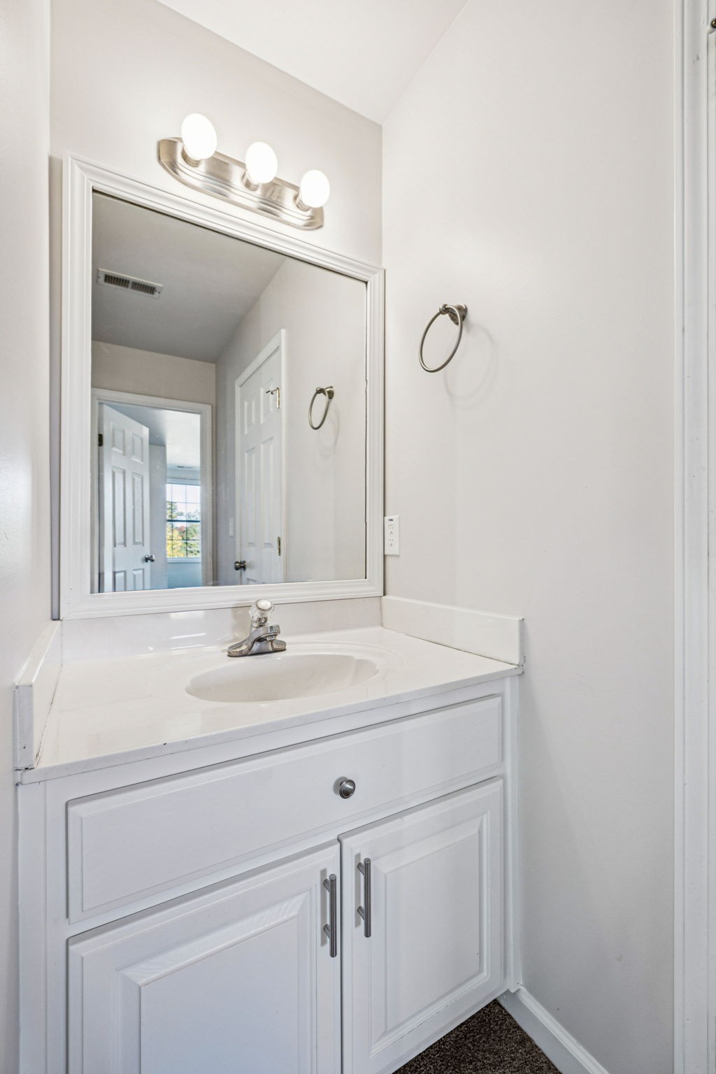 2995 Pipkin Hills Drive Spring Hill, TN 37174 - Photo 34 of 43 a bathroom with a sink and a mirror