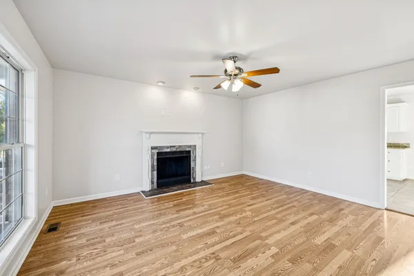 a view of an empty room with a window