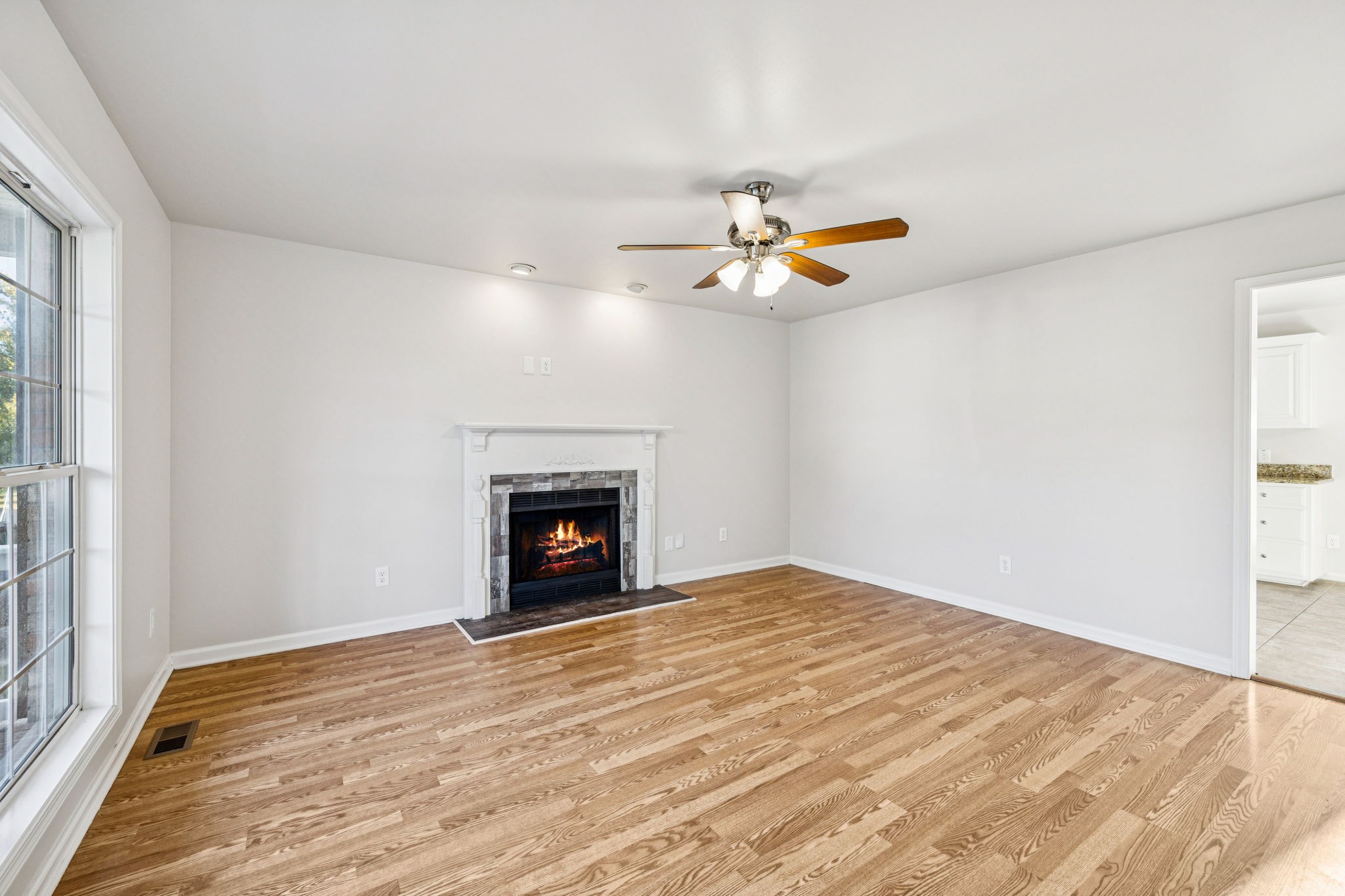 2995 Pipkin Hills Drive Spring Hill, TN 37174 - Photo 6 of 43 a view of an empty room with a window