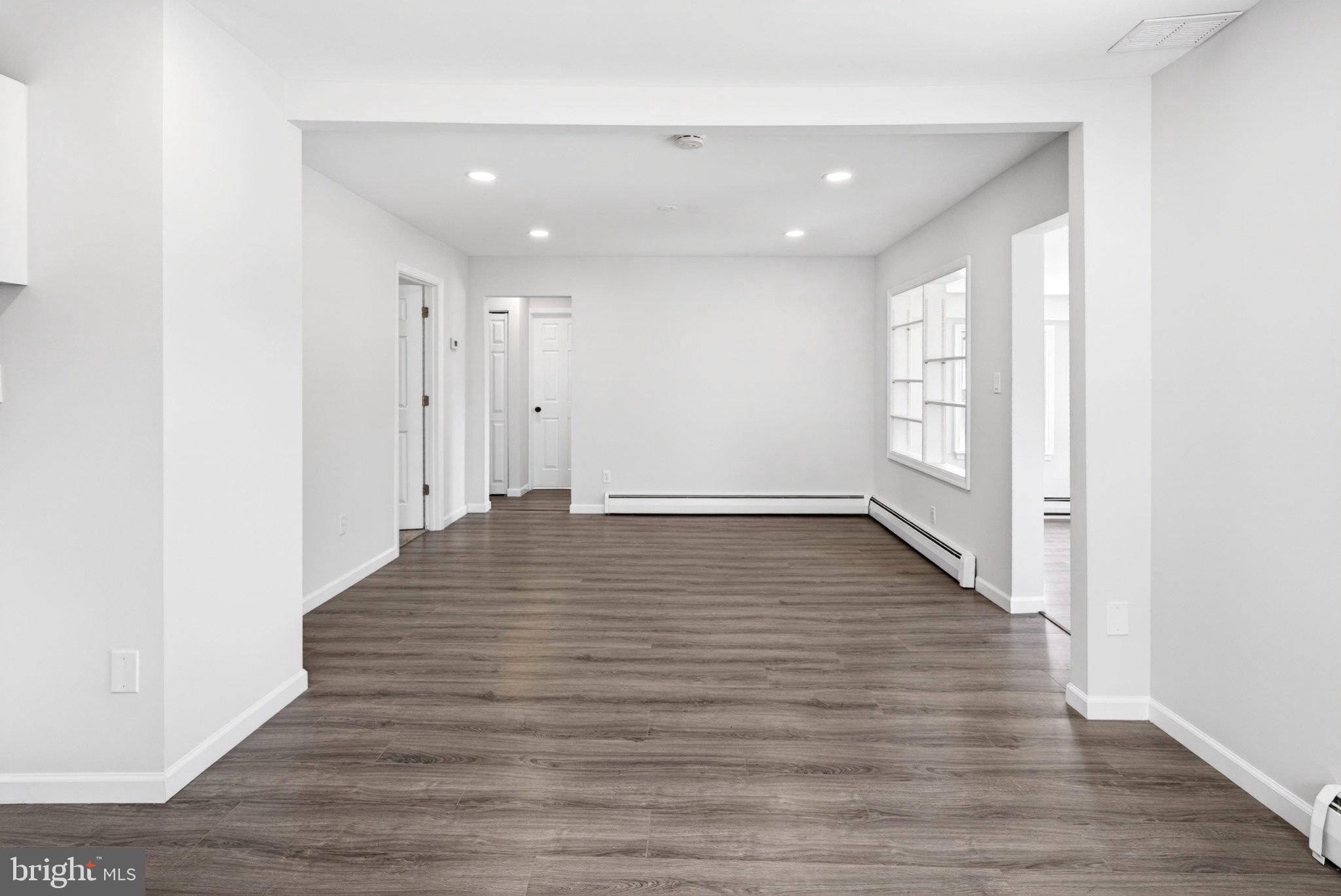 9081 Dumhart Road Laurel, MD 20723 - Photo 14 of 45 Spacious, light-filled living area.