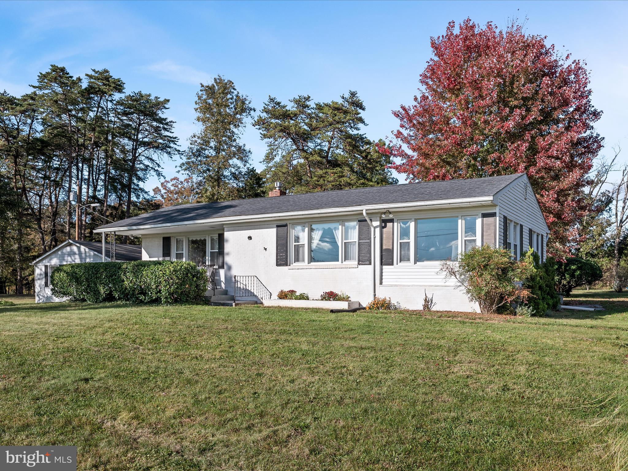 2137 Reliance Road Middletown, VA 22645 - Photo 3 of 56 a front view of a house with a yard