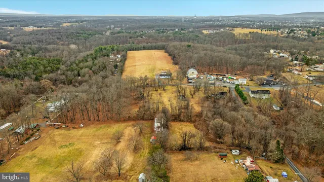a view of a lake with mountains in the background