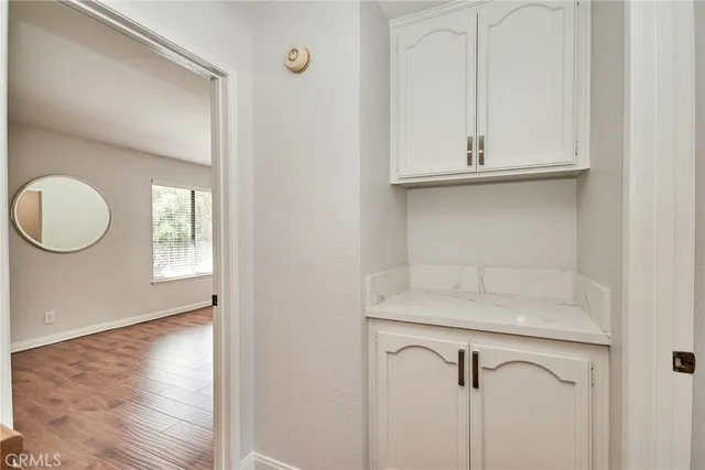 a bathroom with a sink and vanity