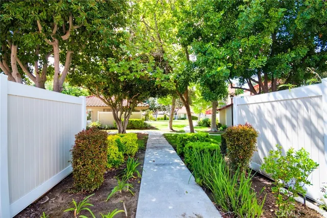 a view of a garden with pathway