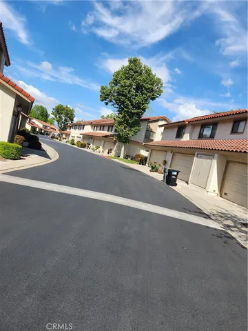 front view of a house with a street