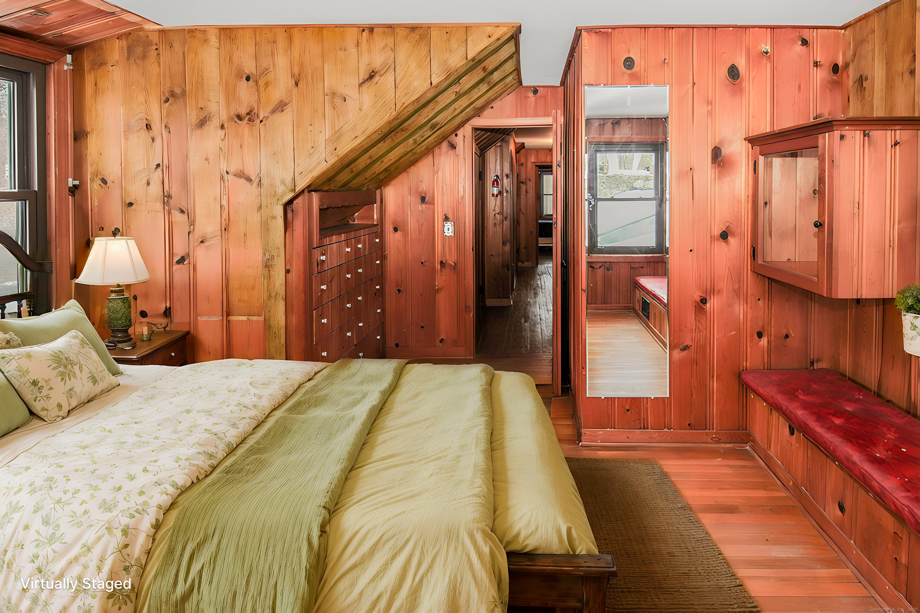 279 Candlewood Lake Road Brookfield, CT 06804 - Photo 19 of 40 a bedroom with a bed and a mirror