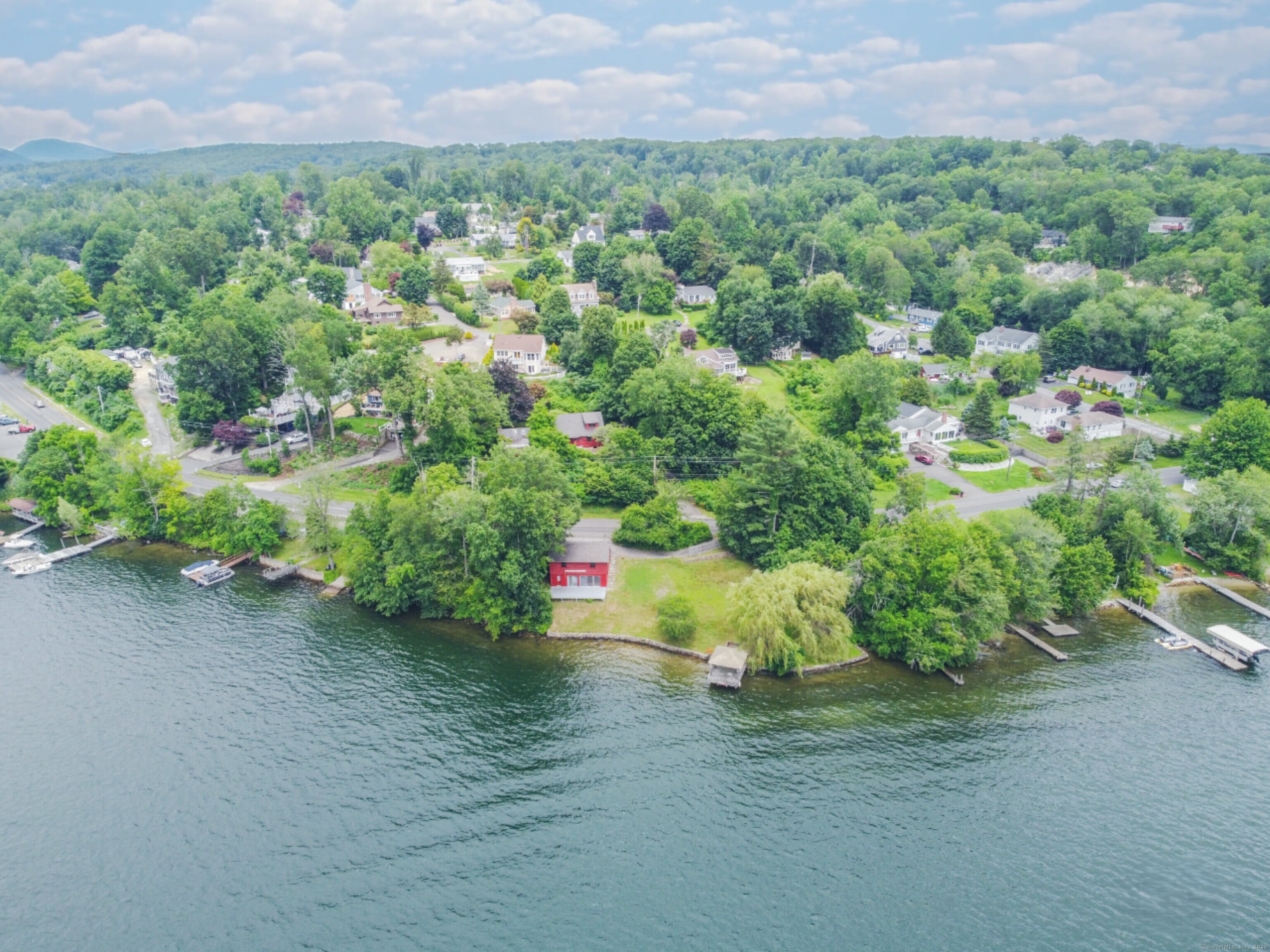 279 Candlewood Lake Road Brookfield, CT 06804 - Photo 2 of 40 a view of a street with a park