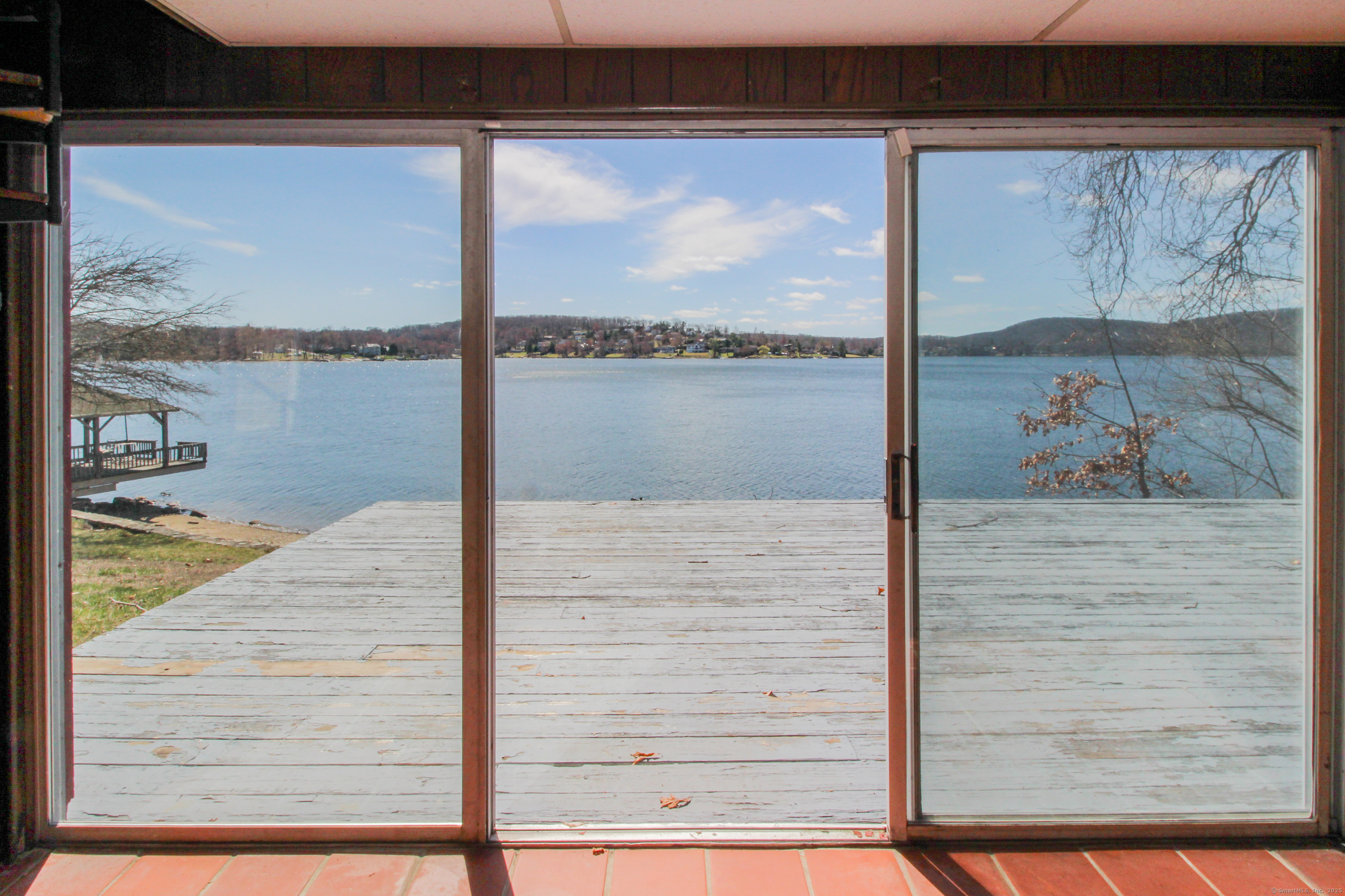 279 Candlewood Lake Road Brookfield, CT 06804 - Photo 23 of 40 a view of a door front of a house