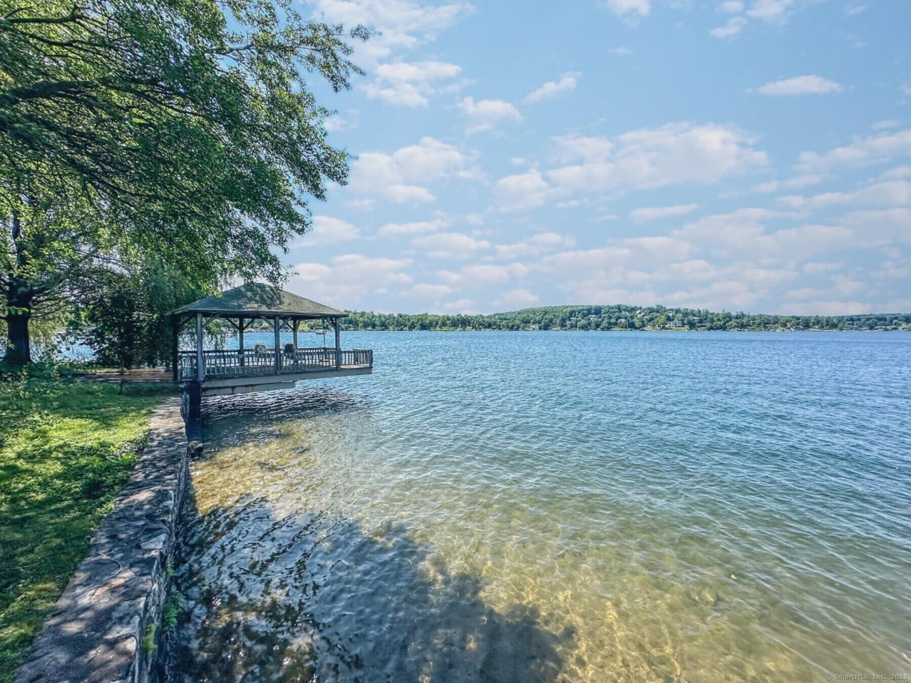 279 Candlewood Lake Road Brookfield, CT 06804 - Photo 39 of 40 a view of a lake with houses in the back