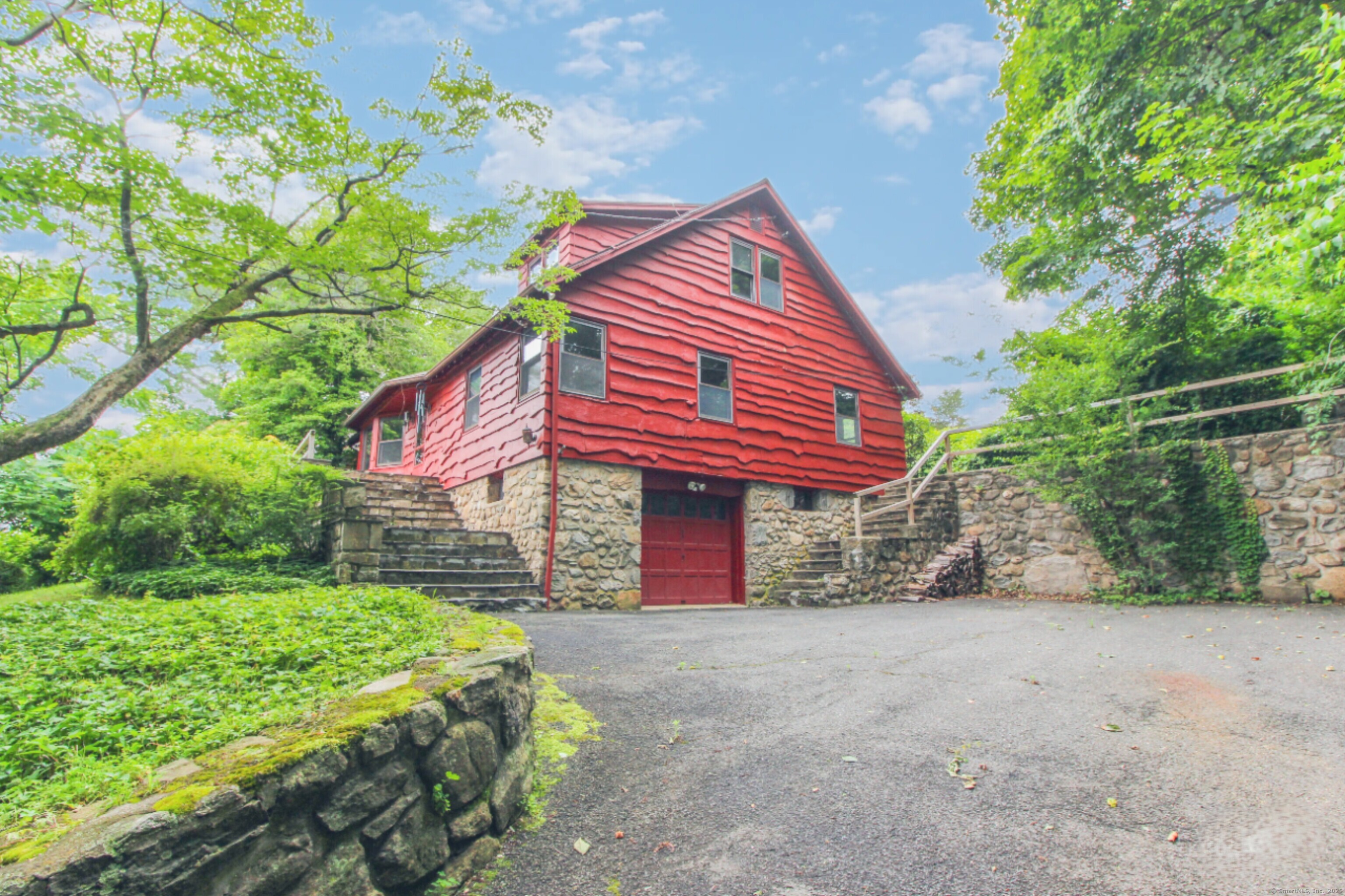 279 Candlewood Lake Road Brookfield, CT 06804 - Photo 5 of 40 a front view of a house with a yard