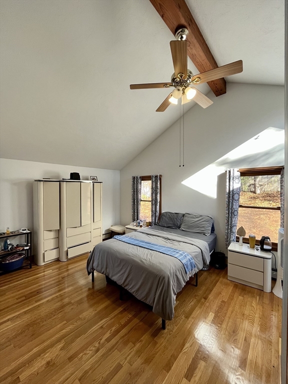 18 Lariviere Road Framingham, MA 01701 - Photo 6 of 8 a spacious bedroom with a bed a dresser and window