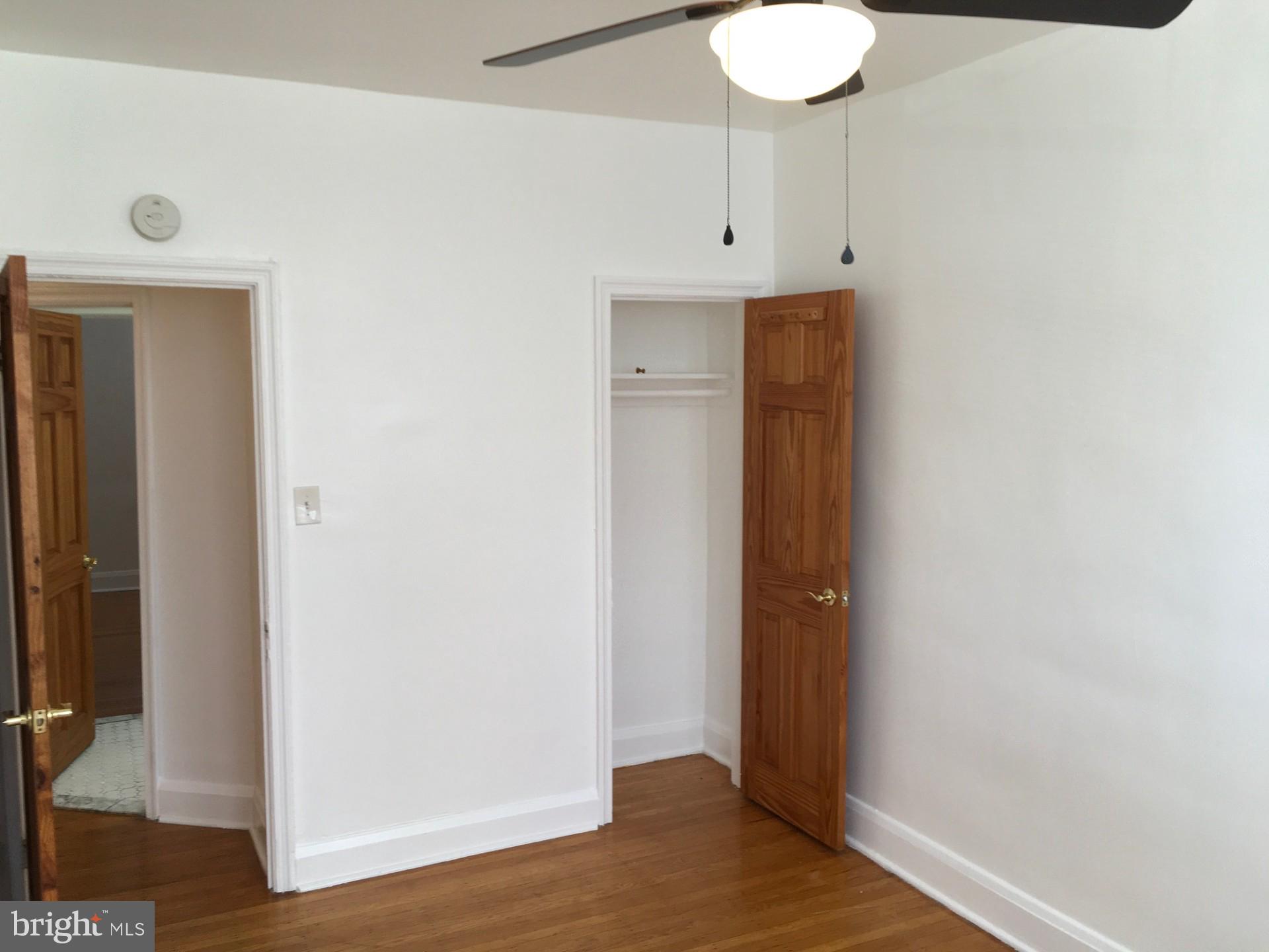 2477 West Cold Spring Lane Baltimore, MD 21215 - Photo 19 of 35 a view of an entryway with wooden floor