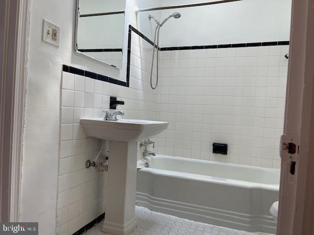 2477 West Cold Spring Lane Baltimore, MD 21215 - Photo 20 of 35 a bathroom with a sink and a bathtub