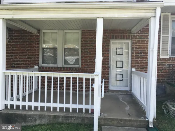 a view of a porch with a chair