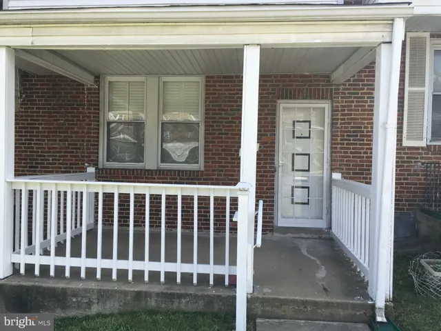 a view of a porch with a chair